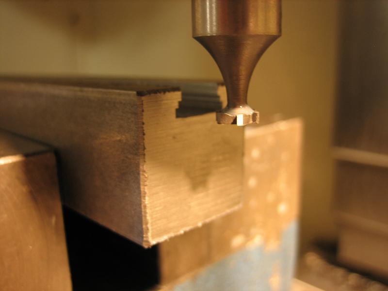 Step profiling a dovetail slot