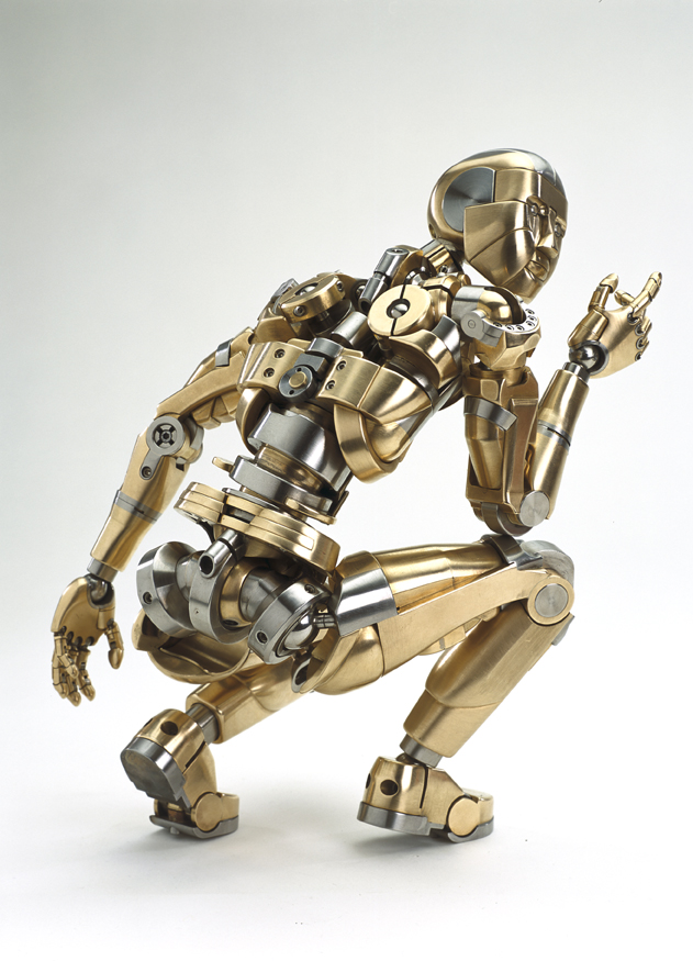 Metallic robot with gold and silver accents, helmeted head, and dynamic pose.