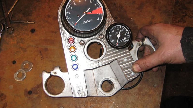 engine turned motorcycle dashboard