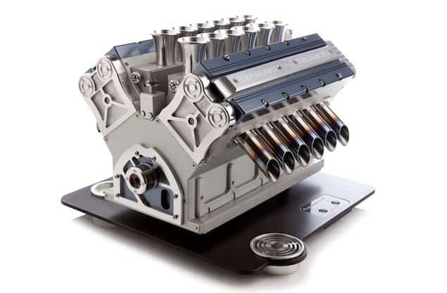 Engine block on black platform.