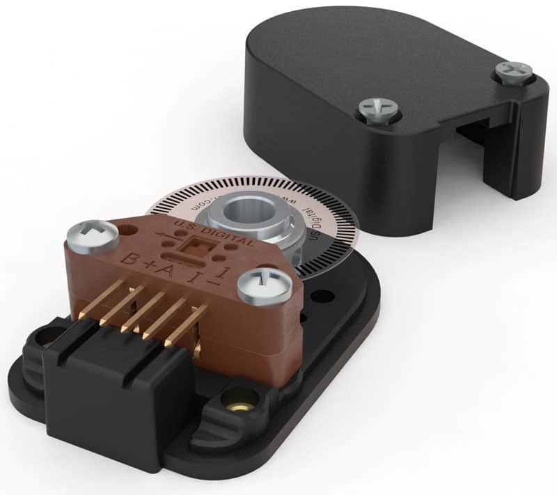 A black and brown circuit board with a brown connector.