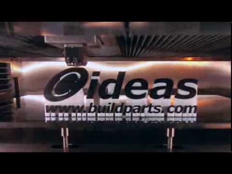 A cylindrical object with the word "ideas" and the website "www.buildparts.com" printed on its surface, mounted on a stand with mechanical components above.