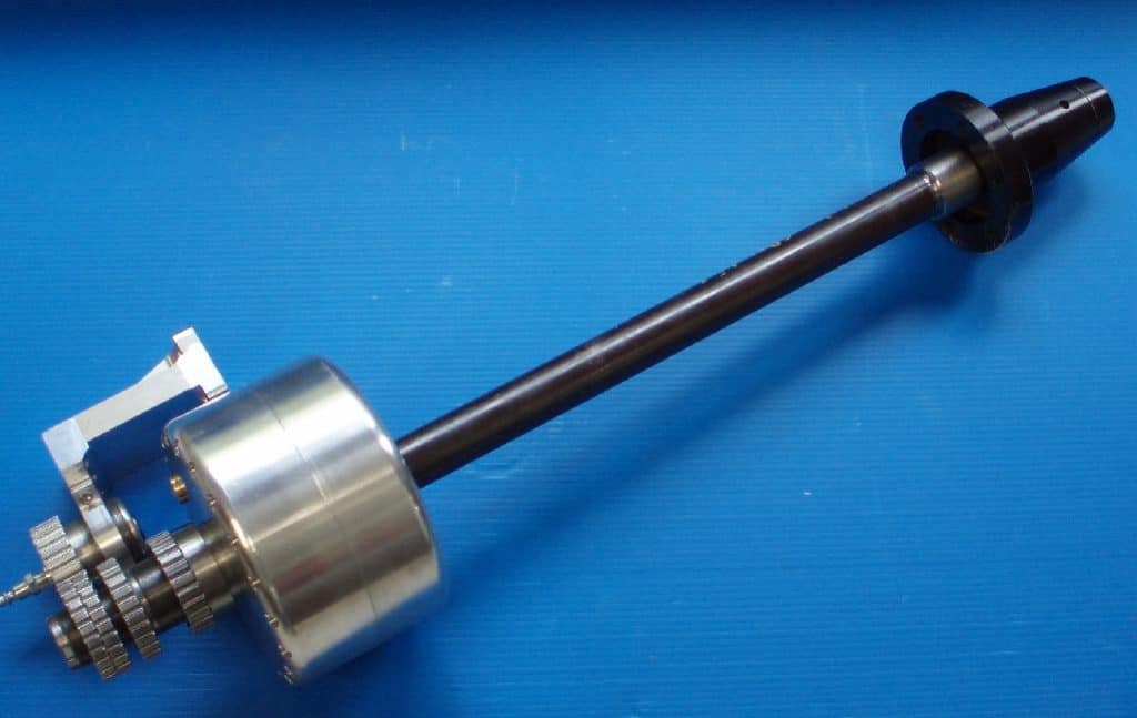 Shaft with collet chuck and gear mechanism.