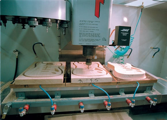 Large milling machine in industrial setting with red "F" logo on the side.