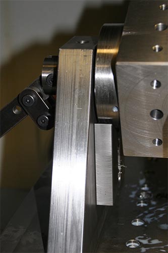 A machine equipped with a metal cutting tool that helps save time by using 4th axis fixtures.