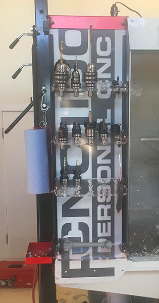 A machine equipped with the SCE TTS Toolholder Racking System, offering a multitude of tools.