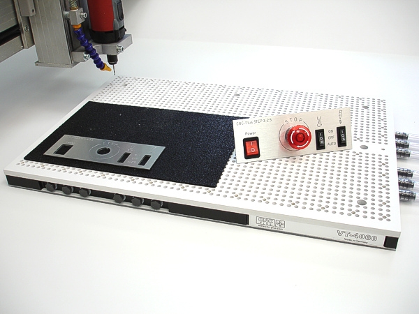 A CNC step motor with a red body, blue cable, and silver base plate.