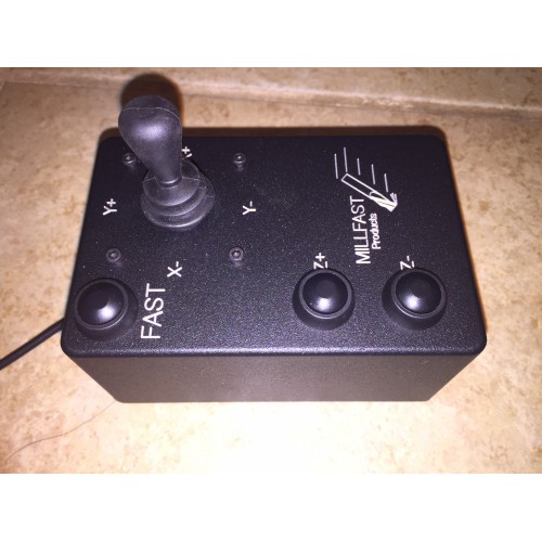 Black joystick control with 'MILLEAST Products' logo, two circular buttons labeled 'FAST' and 'SLOW', and a central button.
