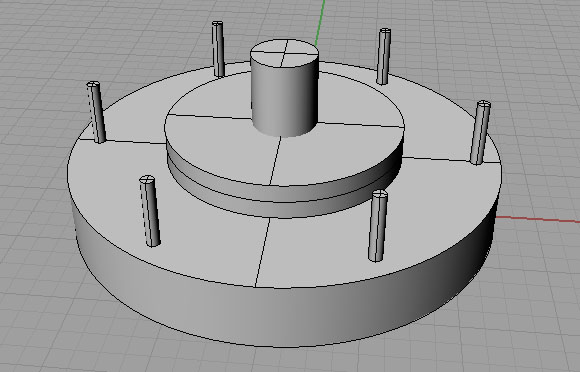 Circular base with central cylinder and six evenly spaced cylindrical extensions.