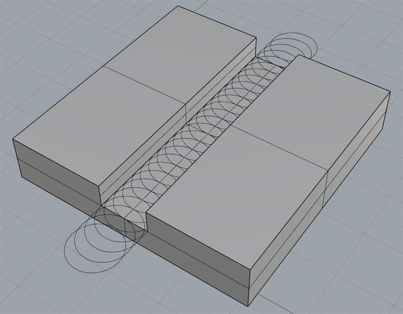 Trochoidal milling pattern on two rectangular blocks.