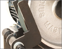 A metal component with the engraving "MASTER".