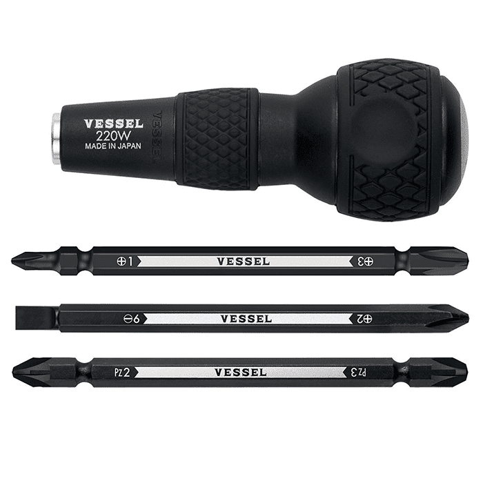 Black Vessel screwdriver handle with interchangeable bits on a light gray background.