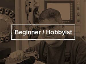 A man is working on a machine with the words beginner hobbyist.