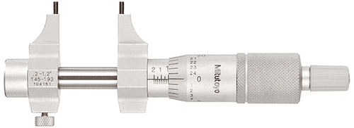 Precision measuring tool with engraved markings.