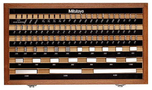 Black background with white text displaying numerical values in rows, featuring "Mitutoyo" in bold.