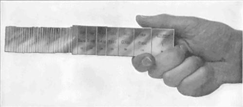 Stainless steel ruler with engraved markings.