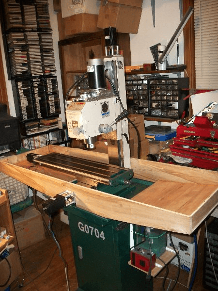 A DIY CNC machine in a woodworking workshop.