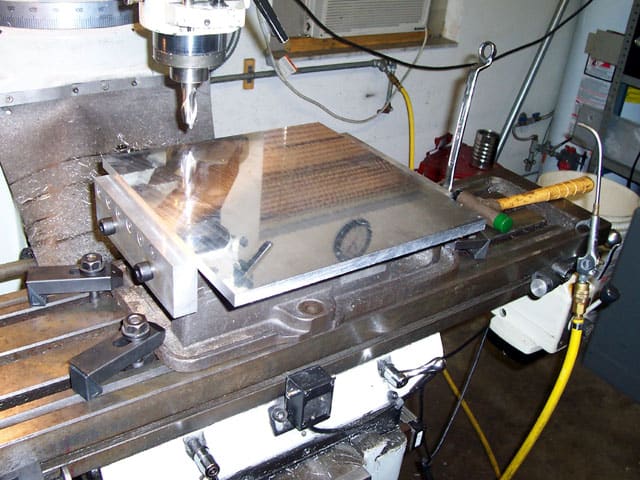 A Kurt Outside Jaw, a metal clamp with adjustable jaws.