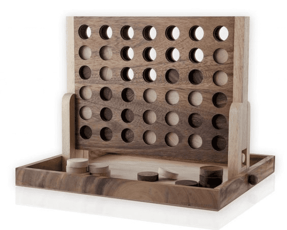 Wooden game board with light-colored finish and dark game pieces in varying size holes.
