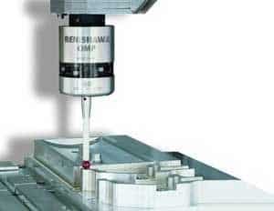 White cylindrical device with long probe over flat surface, featuring a red button and Revision 1.0 label.