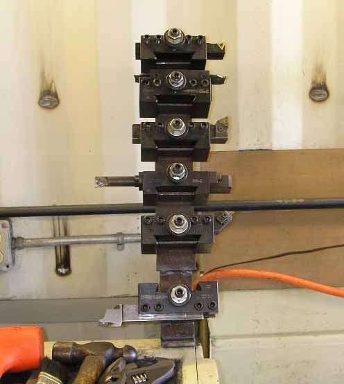 Metal fixture with multiple T-slots.