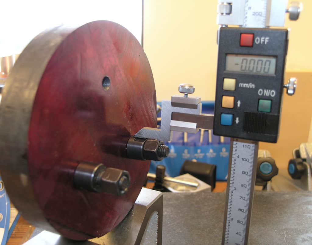 A digital caliper with a compact body and clear LCD screen, showcasing its precise measurement capabilities.