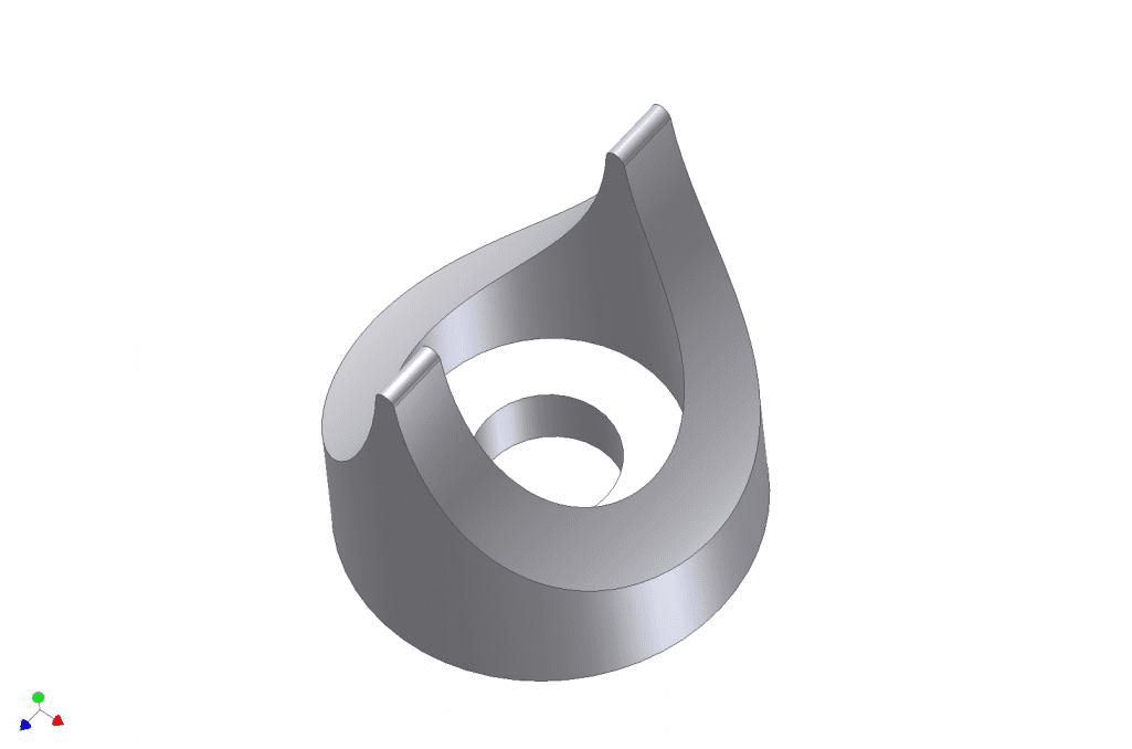 A curved, metallic object with a central hole and two protrusions.
