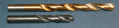 Twisted metal drill bit or cutter.