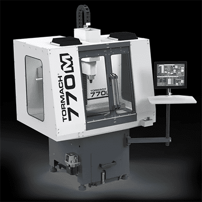 Large Tormach 770M CNC machining center displayed on a dark background.