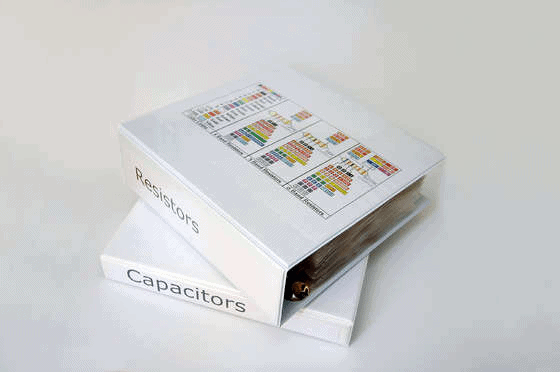 Two electrical engineering binders on a white background.