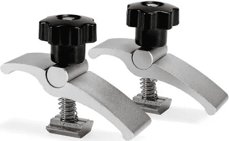 Silver metal clips with black knobs and spring mechanism.