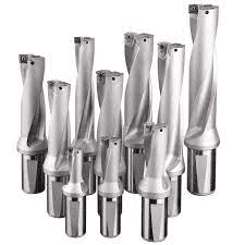 Silver metal parts with cylindrical shapes and tapered ends on a white background.