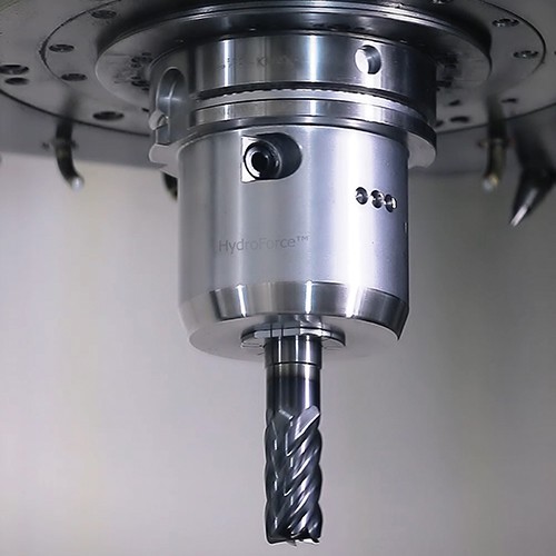 Silver metal drill bit with spiral design, reading "Hydroforce" on the side.
