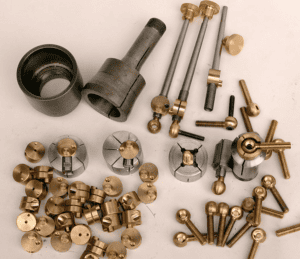 Precision tools, including drill bits and end mills.