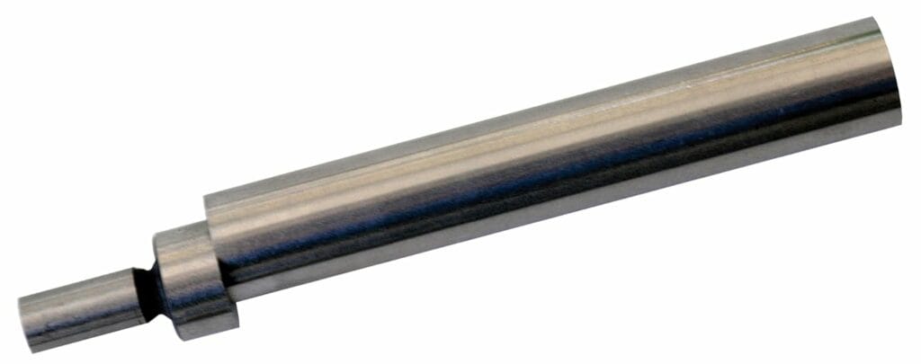 Cylindrical metal object with angled cut and side notch.