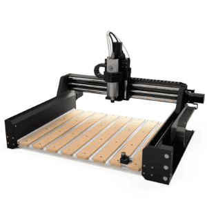 Black and silver metalworking/CNC machining machine on flatbed with wooden platform.